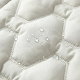 Women's Long Hooded Down Puffer Coat with Quilted Design, Cinched Waist and Pockets