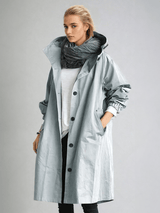 Women's Water-Repellent Hooded Trench Coat with Long Oversized Fit and Button-Up Front