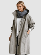 Women's Water-Repellent Hooded Trench Coat with Long Oversized Fit and Button-Up Front
