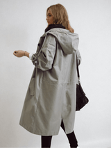 Women's Water-Repellent Hooded Trench Coat with Long Oversized Fit and Button-Up Front