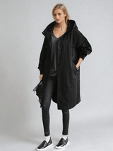 Women's Water-Repellent Hooded Trench Coat with Long Oversized Fit and Button-Up Front