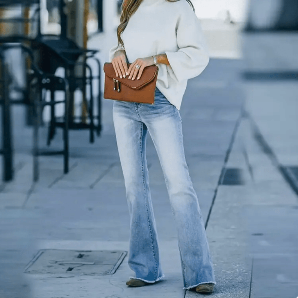 Women's Blue Vintage Wash Flare Jeans with High Waist, Fitted Thigh and Raw Hem