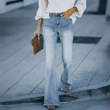 Women's Blue Vintage Wash Flare Jeans with High Waist, Fitted Thigh and Raw Hem
