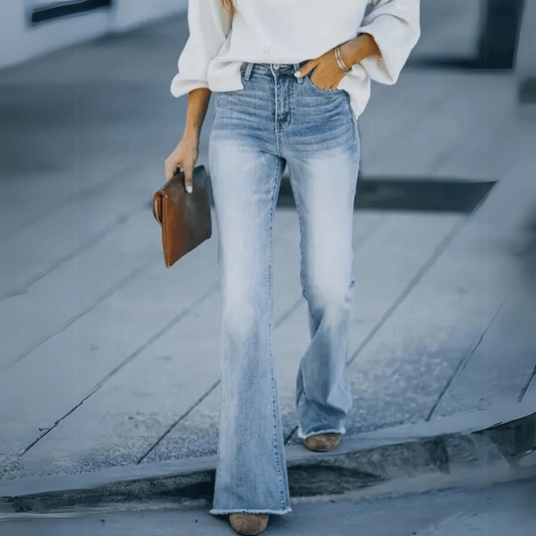 Women's Blue Vintage Wash Flare Jeans with High Waist, Fitted Thigh and Raw Hem